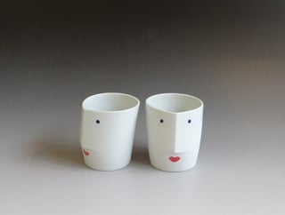 Porcelain Cup with an Image of a Face (Lips and Moustache)