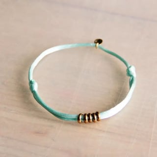 Bazou Satijnen Armband Met Ringen Mint/goud