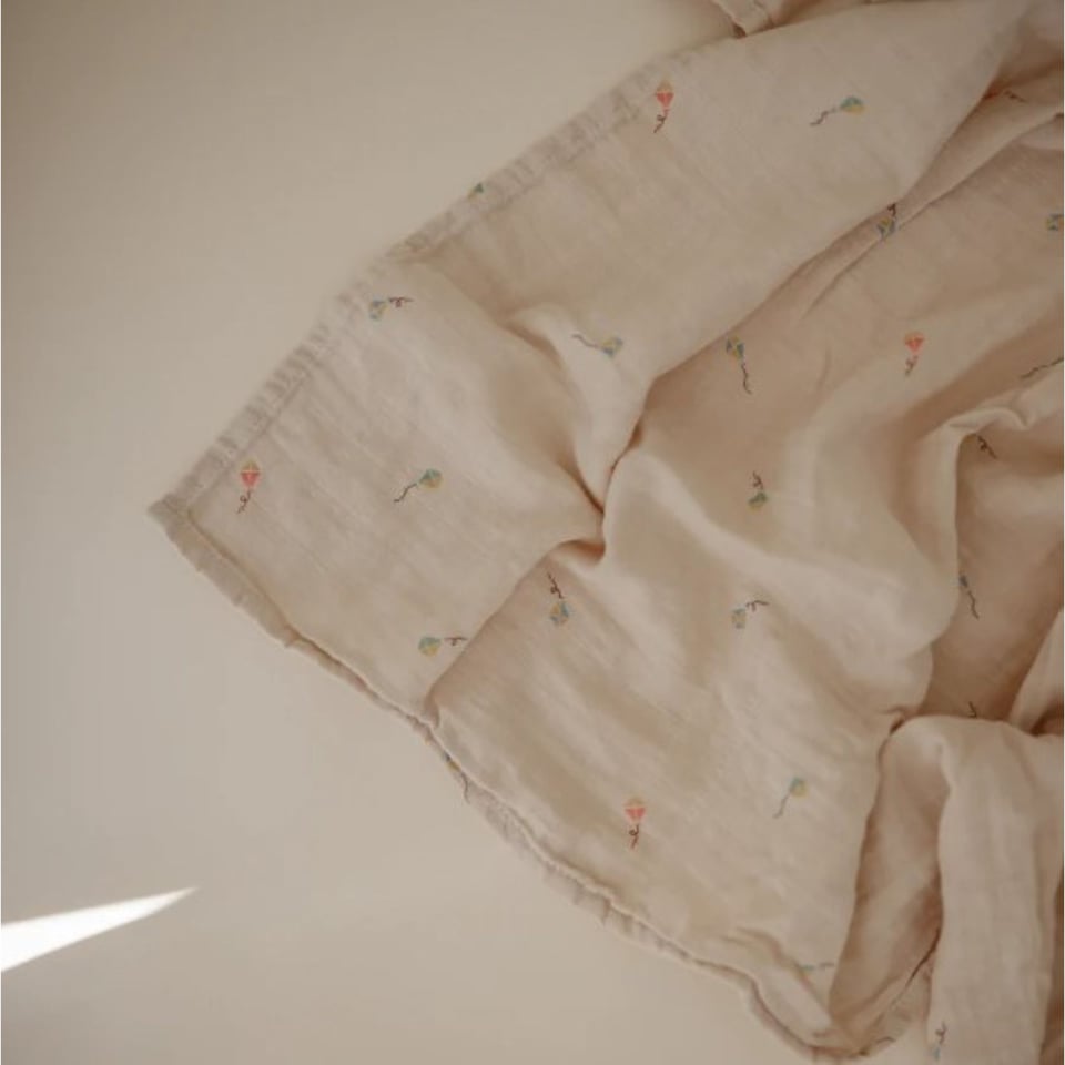 Mushie Swaddle Kite