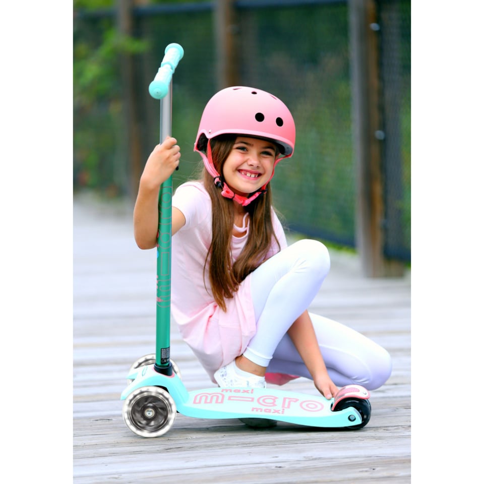 Micro step helm fucsia met licht roze streep maat M 53 -57 cm